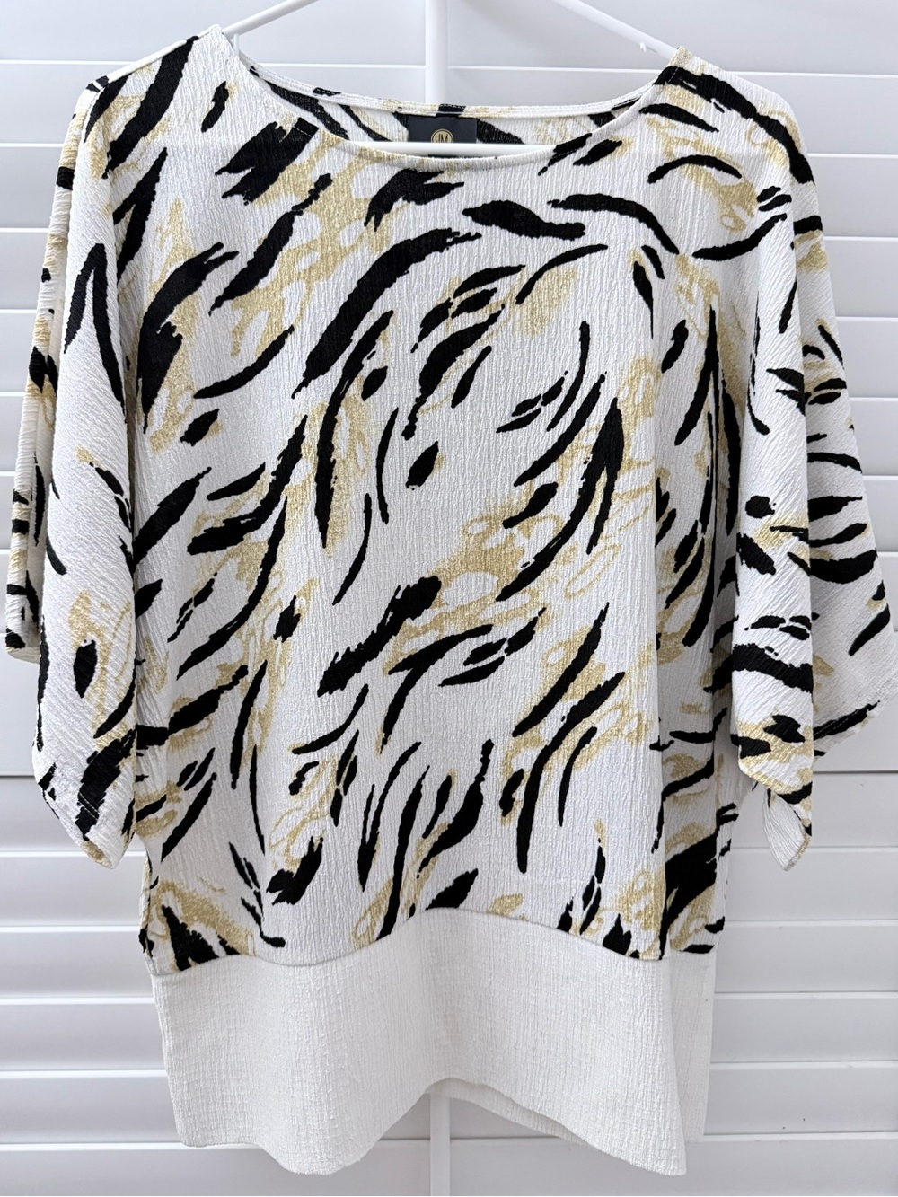 JM Collection White Dolman Top with Black and Gold Animal Print